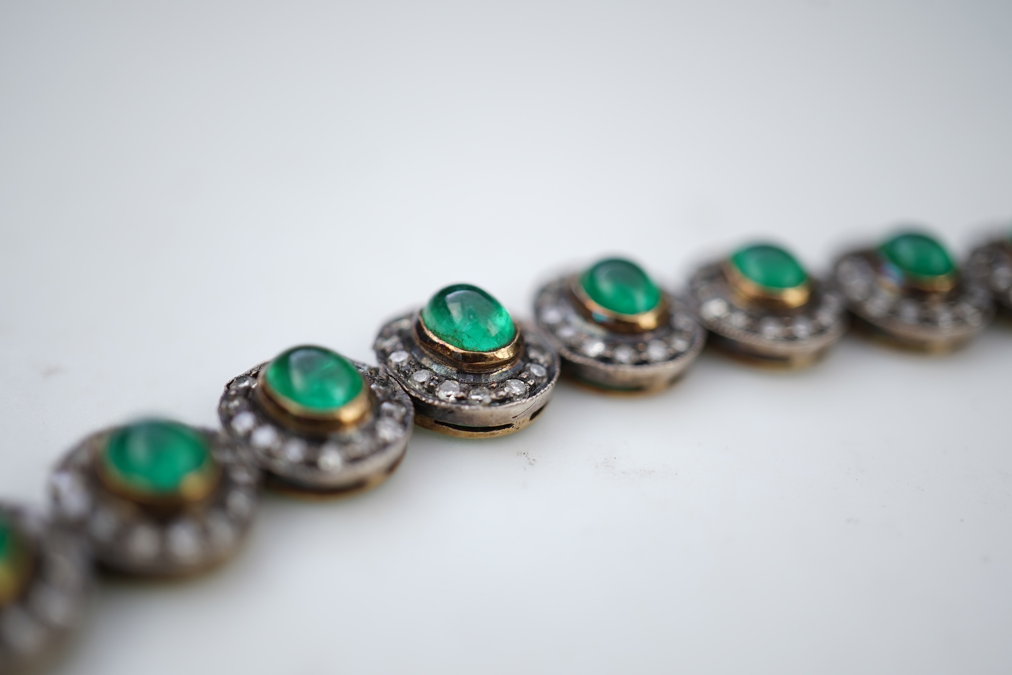An emerald and diamond bracelet
